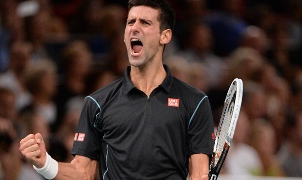 Djokovic defeats Federer in their opening group match at the ATP Finals